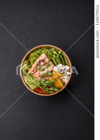 A prawn or shrimp bowl with rice, tomatoes, sauce, and vegetables, Asian food. Prawn or shrimp A prawn or shrimp bowl with rice, tomatoes, sauce, and vegetables, Asian food. Prawn or shrimp 134679412
