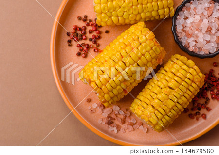 Corn cob cooked in chunks, vegetables, healthy vegetarian food. Boiled corn as a background Corn cob cooked in chunks, vegetables, healthy vegetarian food. Boiled corn as a background 134679580
