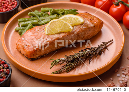 Fish, grilled salmon fillet, healthy food, seafood. Grilled salmon fillet as a background Fish, grilled salmon fillet, healthy food, seafood. Grilled salmon fillet as a background 134679640