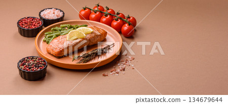 Fish, grilled salmon fillet, healthy food, seafood. Grilled salmon fillet as a background Fish, grilled salmon fillet, healthy food, seafood. Grilled salmon fillet as a background 134679644