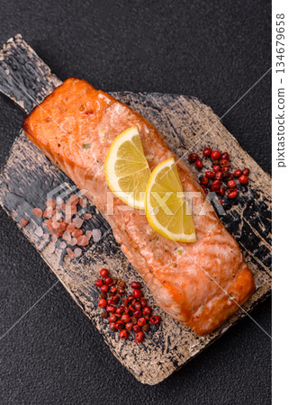 Fish, grilled salmon fillet, healthy food, seafood. Grilled salmon fillet as a background 134679658