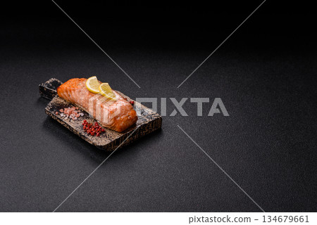 Fish, grilled salmon fillet, healthy food, seafood. Grilled salmon fillet as a background Fish, grilled salmon fillet, healthy food, seafood. Grilled salmon fillet as a background 134679661