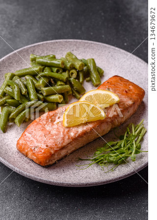 Fish, grilled salmon fillet, healthy food, seafood. Grilled salmon fillet as a background Fish, grilled salmon fillet, healthy food, seafood. Grilled salmon fillet as a background 134679672