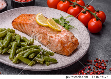 Fish, grilled salmon fillet, healthy food, seafood. Grilled salmon fillet as a background 134679673