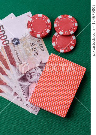 Casino game in the South Korea, won money, chips, cards. Gambling in casinos in the Korea 134679802