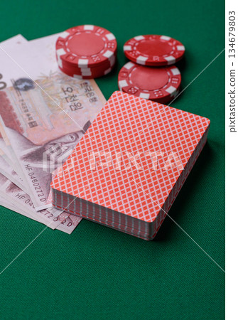 Casino game in the South Korea, won money, chips, cards. Gambling in casinos in the Korea 134679803