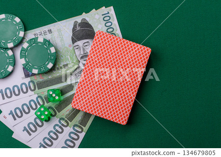 Casino game in the South Korea, won money, chips, cards. Gambling in casinos in the Korea 134679805