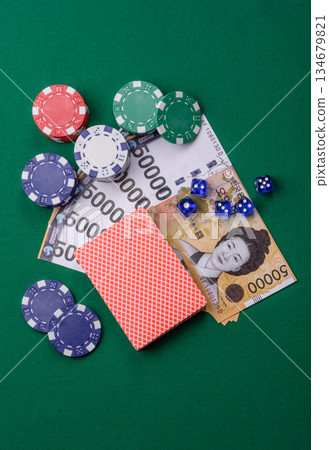 Casino game in the South Korea, won money, chips, cards. Gambling in casinos in the Korea 134679821