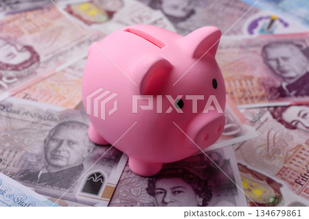 Britain paper money, pound sterling, cash banknotes for financial transactions. Britain money 134679861