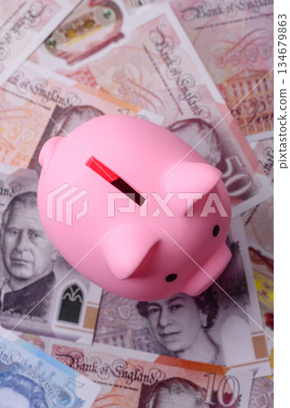 Britain paper money, pound sterling, cash banknotes for financial transactions. Britain money 134679863