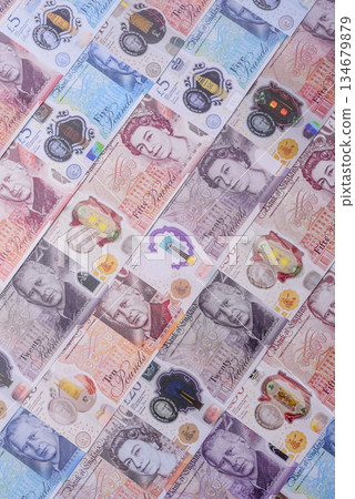 Britain paper money, pound sterling, cash banknotes for financial transactions. Britain money 134679879