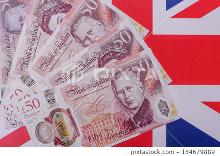 Britain paper money, pound sterling, cash banknotes for financial transactions. Britain money 134679889