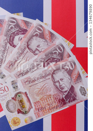Britain paper money, pound sterling, cash banknotes for financial transactions. Britain money 134679890