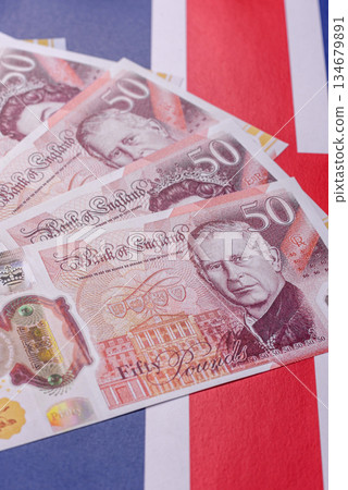 Britain paper money, pound sterling, cash banknotes for financial transactions. Britain money Britain paper money, pound sterling, cash banknotes for financial transactions. Britain money 134679891