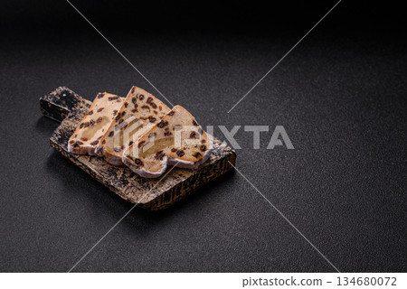 Stollen, a German Christmas pastry for the winter holidays. Stollen as a food background 134680072