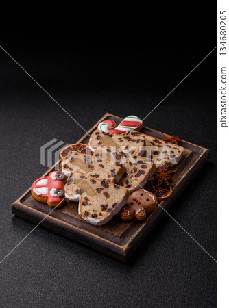 Stollen, a German Christmas pastry for the winter holidays. Stollen as a food background 134680205