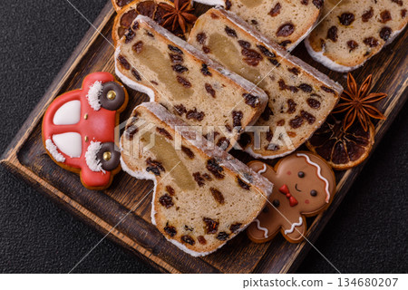 Stollen, a German Christmas pastry for the winter holidays. Stollen as a food background 134680207
