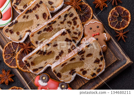 Stollen, a German Christmas pastry for the winter holidays. Stollen as a food background 134680211