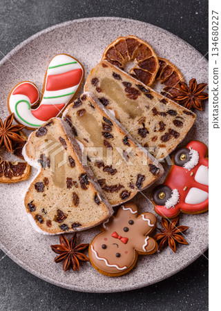 Stollen, a German Christmas pastry for the winter holidays. Stollen as a food background 134680227