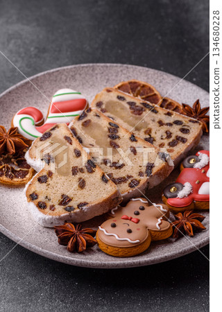 Stollen, a German Christmas pastry for the winter holidays. Stollen as a food background 134680228