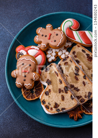 Stollen, a German Christmas pastry for the winter holidays. Stollen as a food background 134680243