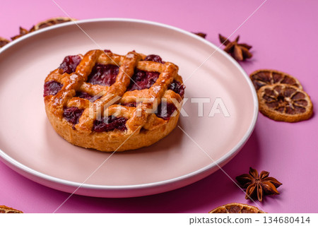 Cherry or strawberry sweet American Christmas pie or tart. American cherry pie Cherry or strawberry sweet American Christmas pie or tart. American cherry pie 134680414