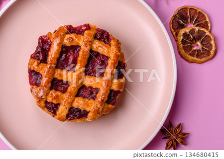Cherry or strawberry sweet American Christmas pie or tart. American cherry pie 134680415