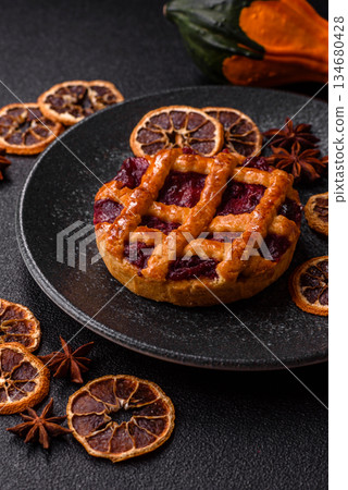 Cherry or strawberry sweet American Christmas pie or tart. American cherry pie 134680428