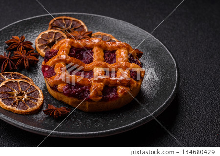 Cherry or strawberry sweet American Christmas pie or tart. American cherry pie 134680429