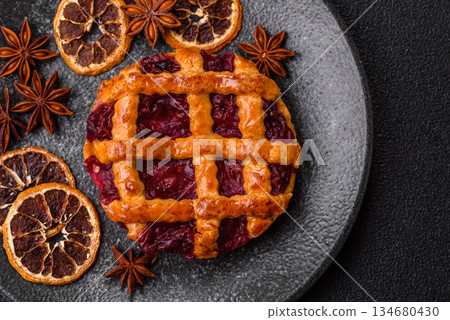 Cherry or strawberry sweet American Christmas pie or tart. American cherry pie 134680430