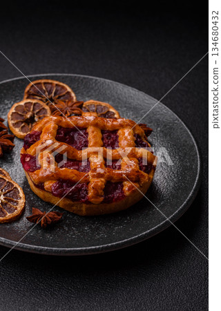 Cherry or strawberry sweet American Christmas pie or tart. American cherry pie 134680432