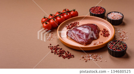 Tuna steak for sashimi or sushi, smoked fish. Tuna steak as a food background Tuna steak for sashimi or sushi, smoked fish. Tuna steak as a food background 134680525