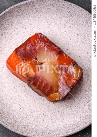 Tuna and salmon roll, smoked fish. Tuna and salmon roll as a food background 134680562