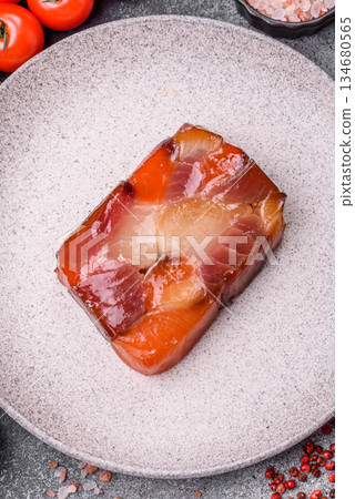 Tuna and salmon roll, smoked fish. Tuna and salmon roll as a food background 134680565
