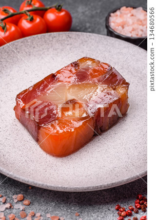 Tuna and salmon roll, smoked fish. Tuna and salmon roll as a food background 134680566