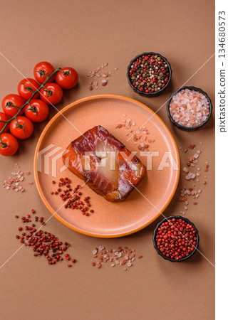 Tuna and salmon roll, smoked fish. Tuna and salmon roll as a food background Tuna and salmon roll, smoked fish. Tuna and salmon roll as a food background 134680573