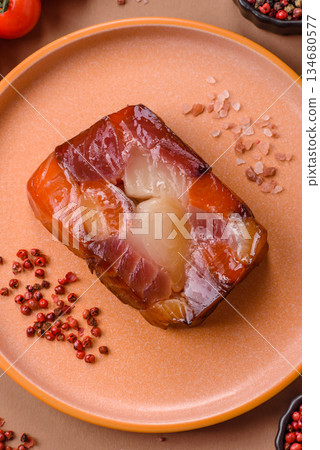 Tuna and salmon roll, smoked fish. Tuna and salmon roll as a food background 134680577