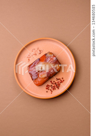 Tuna and salmon roll, smoked fish. Tuna and salmon roll as a food background 134680585