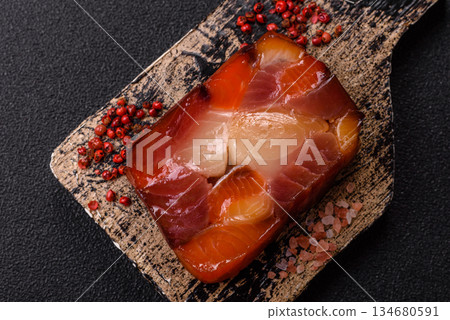 Tuna and salmon roll, smoked fish. Tuna and salmon roll as a food background 134680591