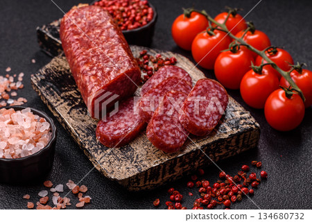 Smoked salami slices, beef or chicken sausage for sandwiches. Salami slices Smoked salami slices, beef or chicken sausage for sandwiches. Salami slices 134680732