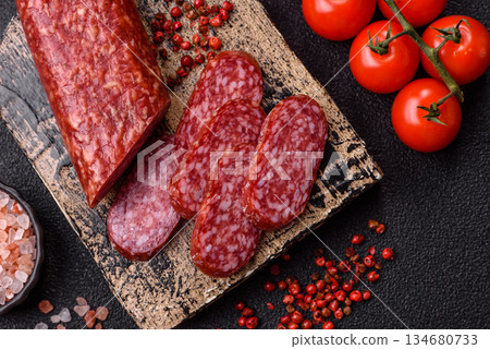Smoked salami slices, beef or chicken sausage for sandwiches. Salami slices Smoked salami slices, beef or chicken sausage for sandwiches. Salami slices 134680733