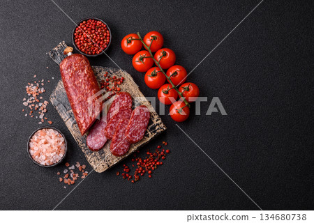 Smoked salami slices, beef or chicken sausage for sandwiches. Salami slices Smoked salami slices, beef or chicken sausage for sandwiches. Salami slices 134680738