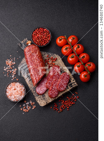 Smoked salami slices, beef or chicken sausage for sandwiches. Salami slices 134680740