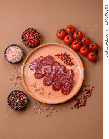 Smoked salami slices, beef or chicken sausage for sandwiches. Salami slices Smoked salami slices, beef or chicken sausage for sandwiches. Salami slices 134680803