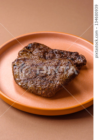 Food, grilled beef steak, roast meat for lunch. Grilled beef steak Food, grilled beef steak, roast meat for lunch. Grilled beef steak 134680939