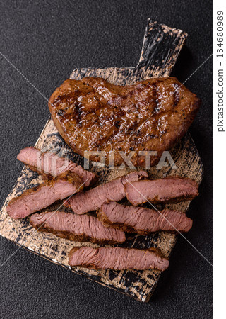 Food, grilled beef steak, roast meat for lunch. Grilled beef steak Food, grilled beef steak, roast meat for lunch. Grilled beef steak 134680989
