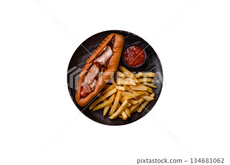 French fries are salty, crispy, and fried in oil, unhealthy takeaway food. French fries French fries are salty, crispy, and fried in oil, unhealthy takeaway food. French fries 134681062