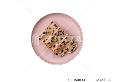 Stollen, a German Christmas pastry for the winter holidays. Stollen as a food background 134681090