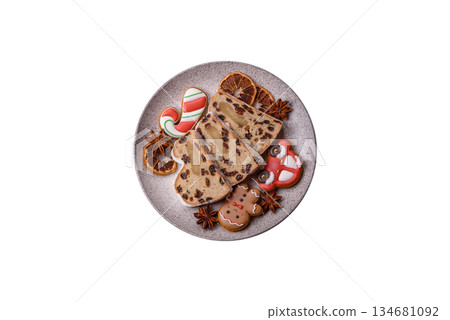 Stollen, a German Christmas pastry for the winter holidays. Stollen as a food background 134681092