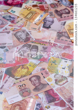 Money background, currency exchange, paper banknotes from different countries. Money cash currency 134681235